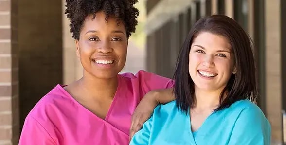 smiling female medical professionals-588x298